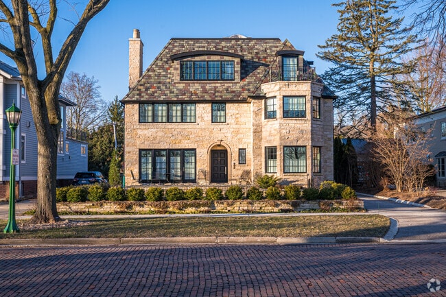 Wilmette has a variety of home styles including this one along a brick paved street.
