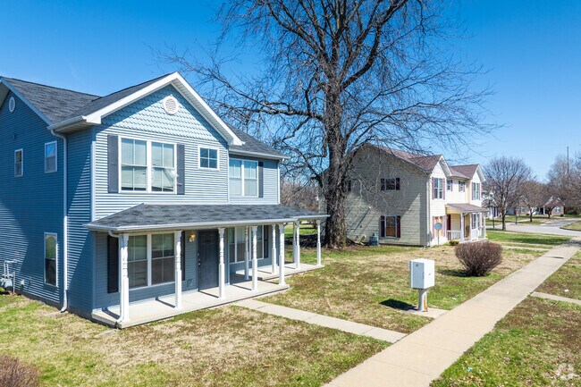New Traditional duplexes are common along Wabash Crossing's lush green streets.