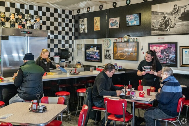 Step back in time and enjoy the retro diner scenery of Poppy's Place.