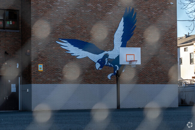 Henry E. Harris No.1 Elementary sports a courtyard with it's school mascot on the wall.