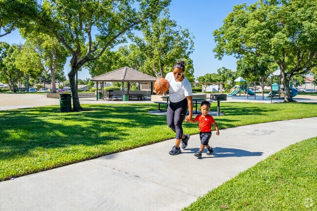 Walkers enjoy the outdoor space at Koehier Park adjacent to the Bellgrove neighborhood.