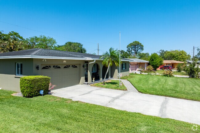 Many University Park homes have garages with broad driveways.