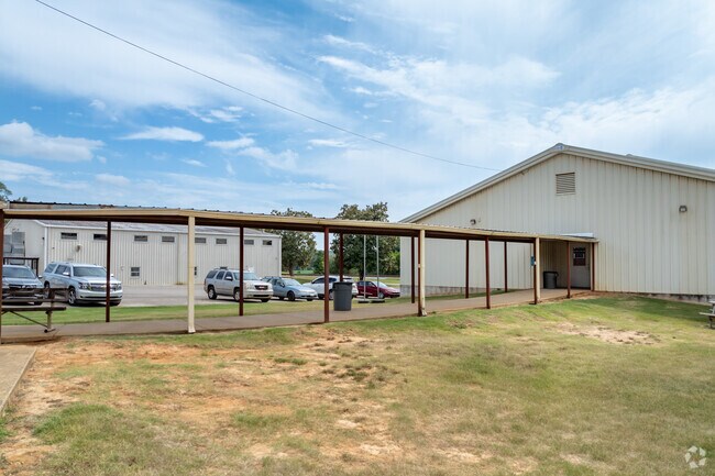 Covered walkways at Potts Camp High School help keep students dry on rainy days.