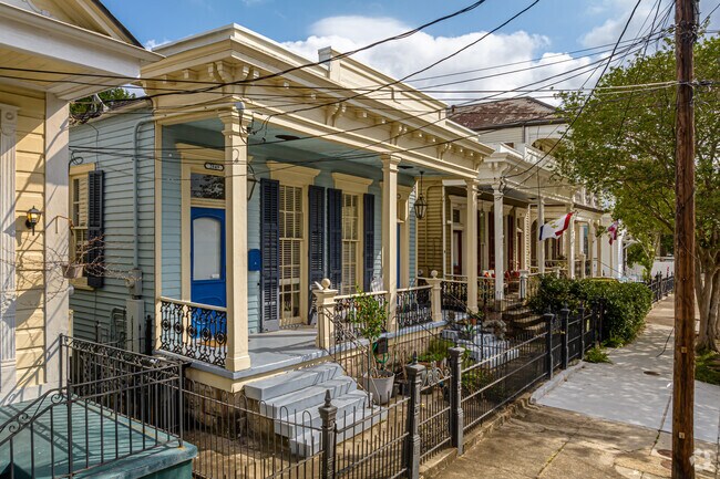 Converted double shotgun homes are common in Central City.