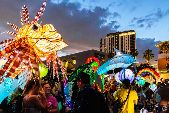 Visitors can learn to make lanterns and then join in the fun at Tampa Riverfest near Rainbow Heights.