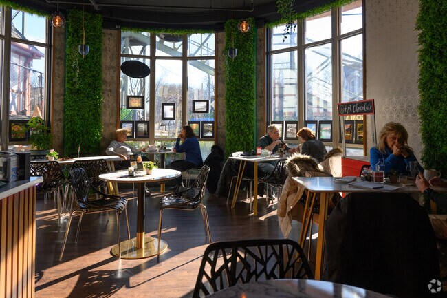 Near the train station lies SOMA Cafe & Creperie, a convenient stop for a latte or snack.