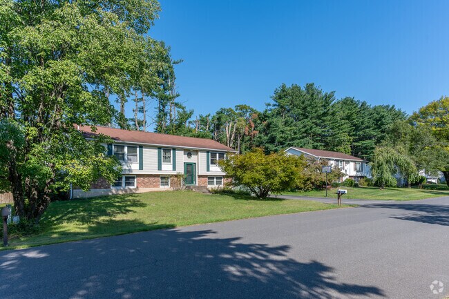 Other roads in Tillson feature modest 20th-century bi-levels and ranch-style homes.