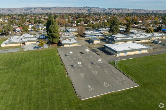 Bridgepoint High School has basketball courts and a blacktop for sports on campus.