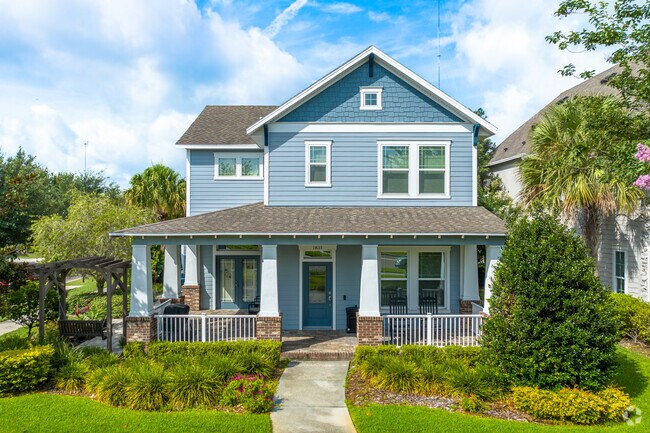 Residents of FishHawk enjoy lounging in their front porches in their bungalow-style homes.