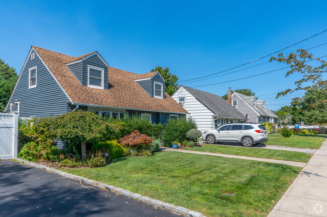 Quaint and cozy Cape Cod homes adorn the streets of Merrick.