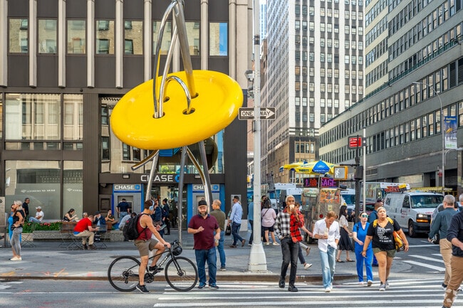 You'll know you're in the Garment District by spotting the 28 ft tall Needle & Thread statue.
