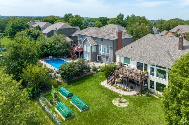 Large homes in The Ridges often feature spacious backyards with pools or other amenities.