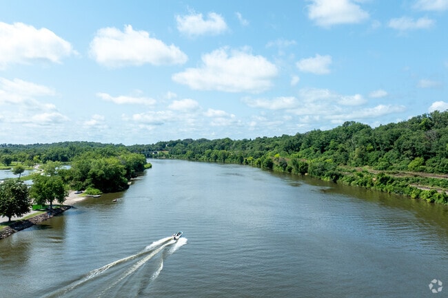 Hop on a boat and cruise down the Cedar River when living in Ellis Harbor.