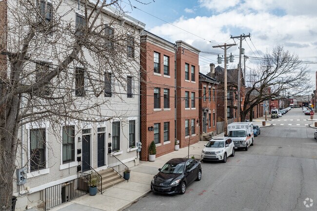 City townhouses line the back streets of the Bluff neighborhood.