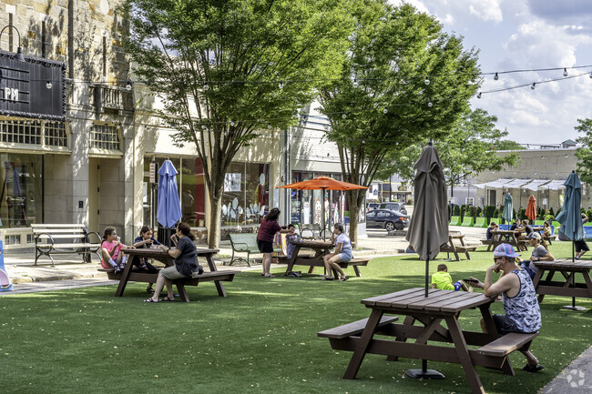 Norwood residents enjoy the expansive green space in downtown.