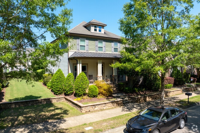 Front-facing gables compliment this Craftsman home in Wade, NC.