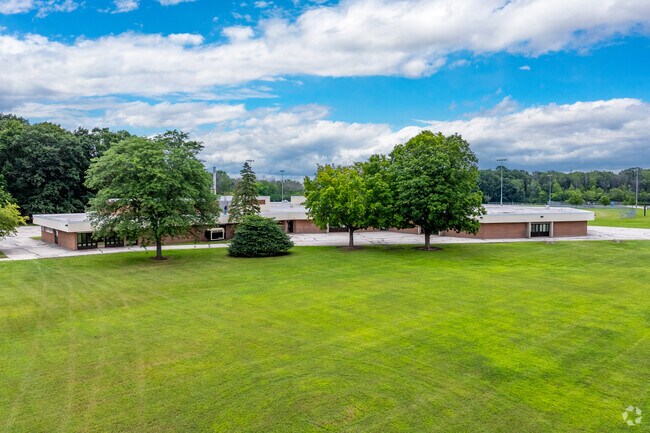 Macarthur Elementary School scores a B- by Niche.