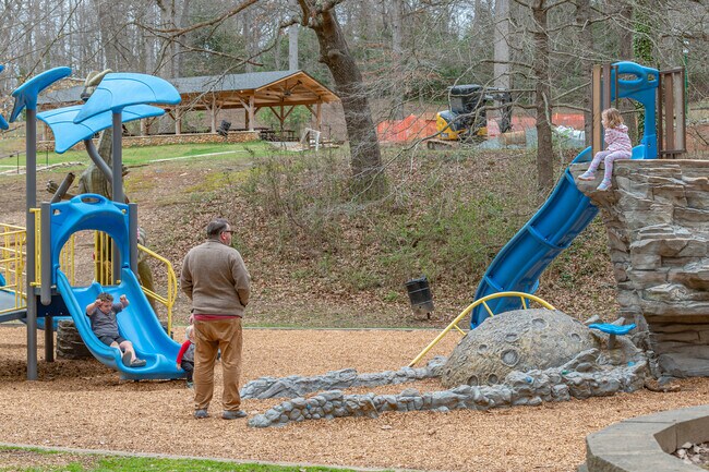 Washington Park families love heading to the dinosaur themed playground.