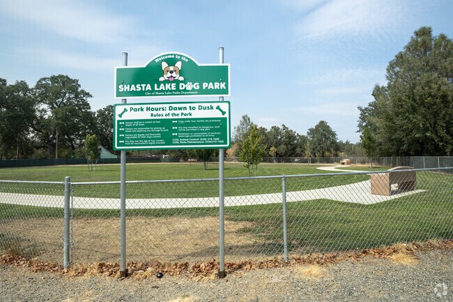 Shasta Lake Dog Park Is a place to let the pups run and play.