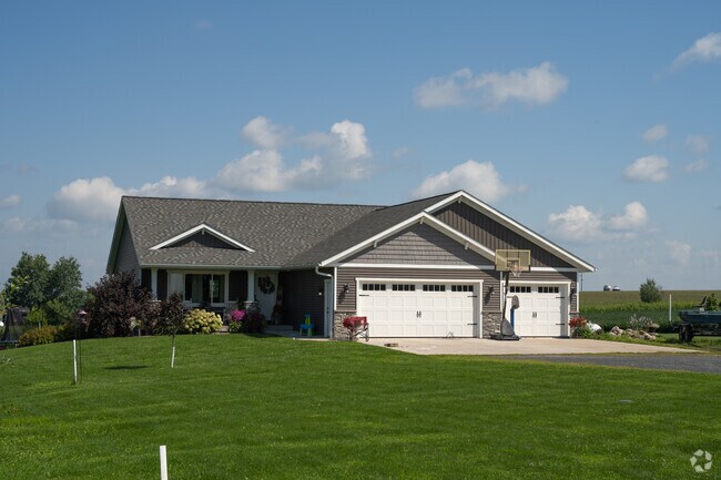 Newer homes further from downtown Stanley have larger lawns.
