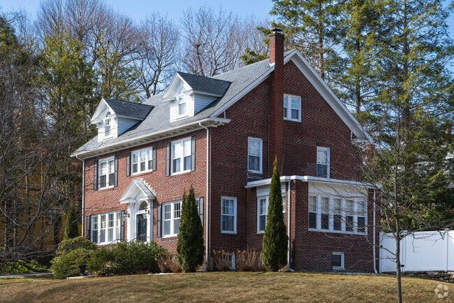 A timeless colonial home, showcasing classic charm with its symmetrical design and elegant details in Newton Square.