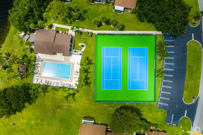 The tennis courts next to the pool in Tradewinds are a popular amenity in Dos Lagos.