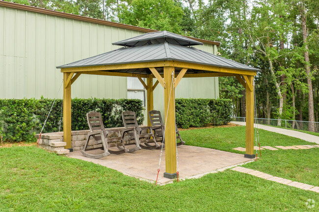 There is a gazebo with rocking chairs at Victory Christian Academy.