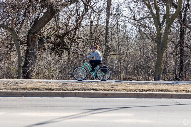 Enjoy a bike ride along the Indian Hills Greenway Trail.