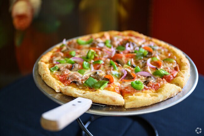 You'll get some delicious pizza at Caesar's Italian Restaurant in South Trenton.