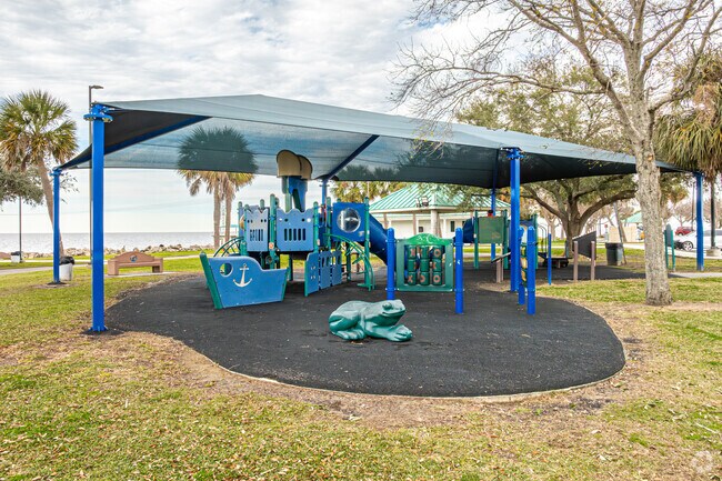 Kids enjoy playing on the playground equipment at Laketown in Kenner.