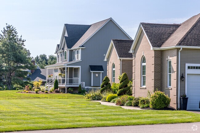 This row of newer homes in the Monroes South Seekonk neighborhood is typical of high-end ones.