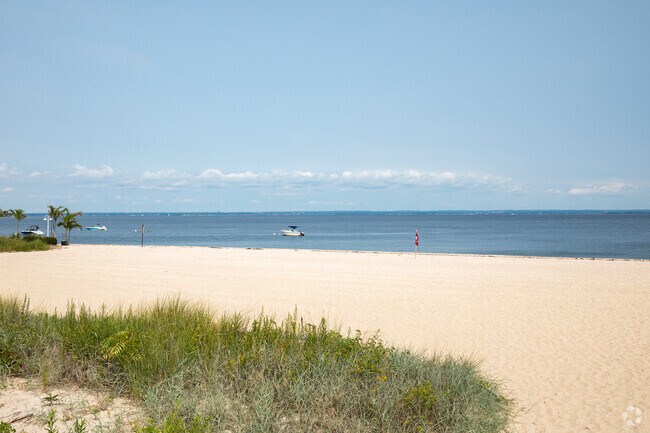 Relax on the sand at Soundside Beach in Bayville.