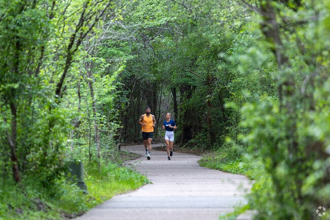 Runners take advantage of the miles of trails that wind through The Woodlands and Eastshore.