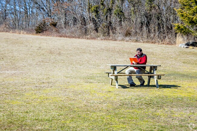 Enjoy a book about the latest photo techniques at Hermann Greim Park.