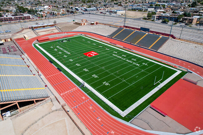 Watch a local Friday night football game at Wilson Stadium at the Manzano High School.