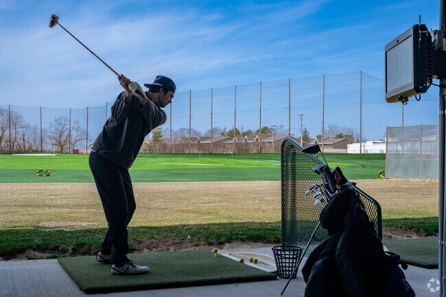 Perfect your swing at the driving range at Carls' Golfland in Bloomfield.