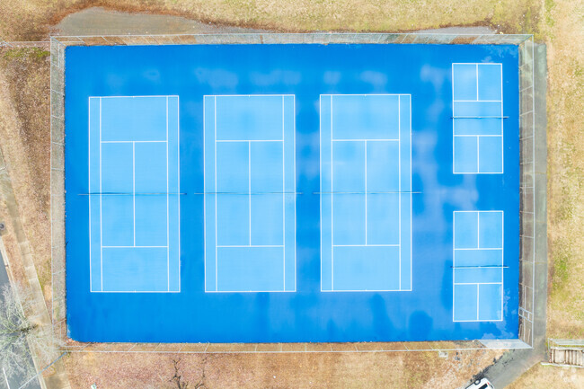 An aerial view of the tennis courts at Thomas C. Boushall Middle School.