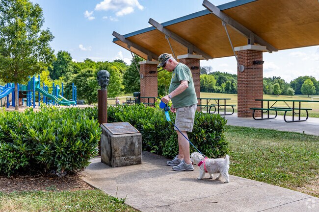 Take your dog out for a walk at the peaceful Victor Ashe Park.