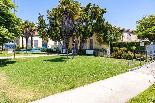 Palm trees line the property of the aptly named Palms Elementary School in Palms, CA.