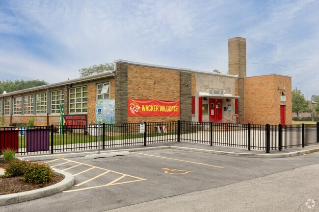 Charles H. Wacker Elementary School side entrance 2, home of the wildcats, Chicago, IL.