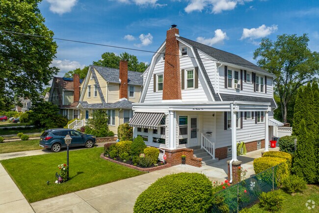Dutch Colonial-Revivals feature barn-like roofs in Collingswood.