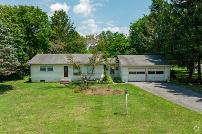 Ranch style homes in Northwest Ithaca often have detached garages.
