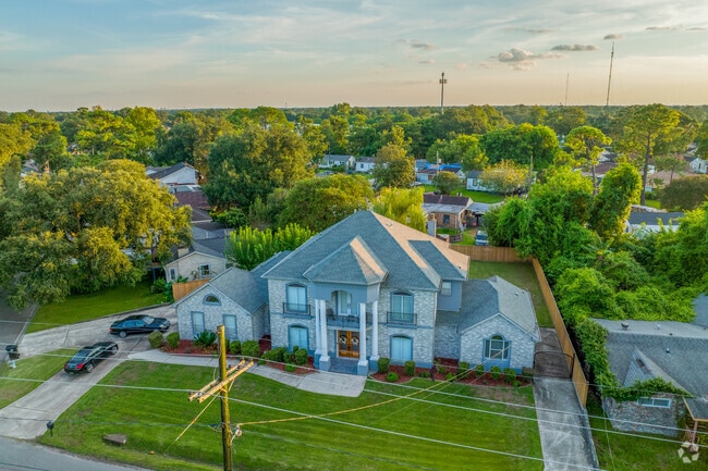 Well-manicured lawns are a frequent sight in the Old Aurora neighborhood.