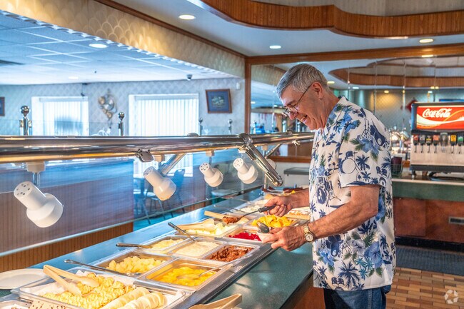 A man fills up with some treats at the China King Buffett near Cody.