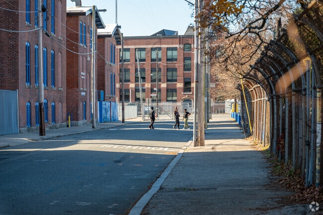Students enjoying their break time outside of
 the Alfred Lima Elementary School in Providence.
