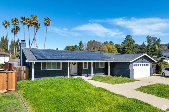 A beautifully updated ranch-style home in Diablo Shadows with energy-efficient solar panels.