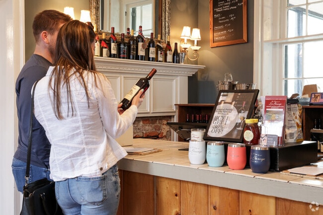 Relax with a glass of wine at the Winery At La Grange near the Woolsey neighborhood.