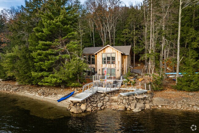 This beautiful home sits on the edge of Deering Reservoir.