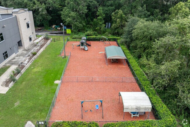 Students enjoy the playground at The Academy.