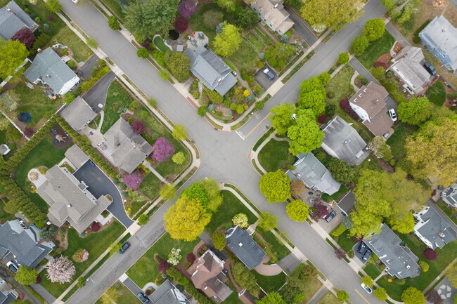 Sidewalks and trees line the streets throughout the Ho-Ho-Kus neighborhood.